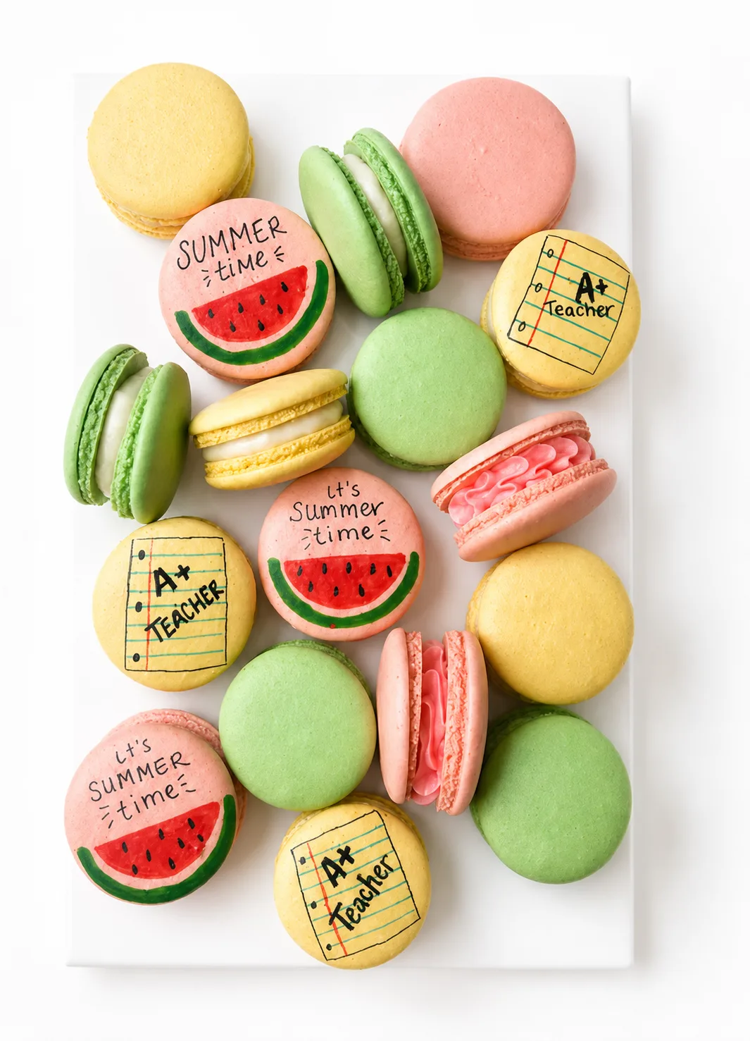 Pastel macarons decorated with summer and teacher designs